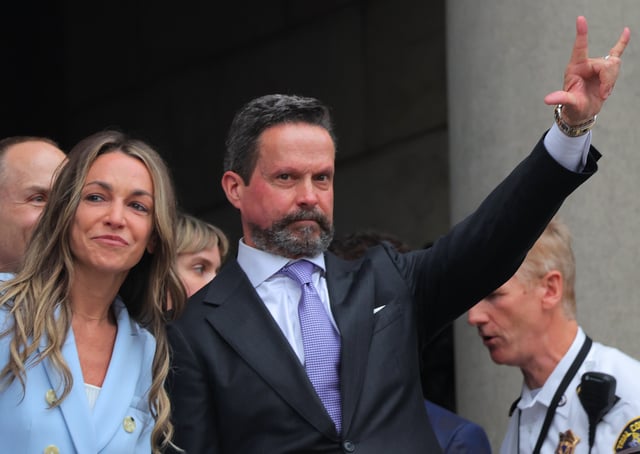 Dedham, MA – June 18: Karen Read and lawyer Alan Jackson emerge after her trial outside Norfolk Superior Court on June 18, 2025. (Photo by Lane Turner/The Boston Globe via Getty Images)
