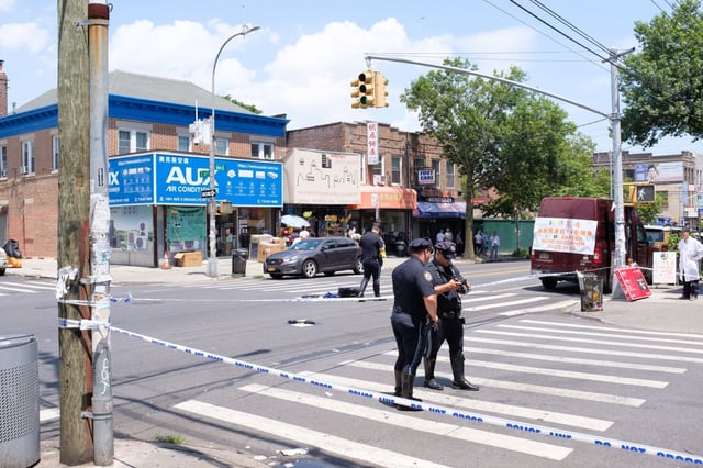Police investigate after a pedestrian was struck by a scooter on East 14th Street and Avenue U in Brooklyn, New York City on Tuesday, July 8, 2025. (Gardiner Anderson / New York Daily News)