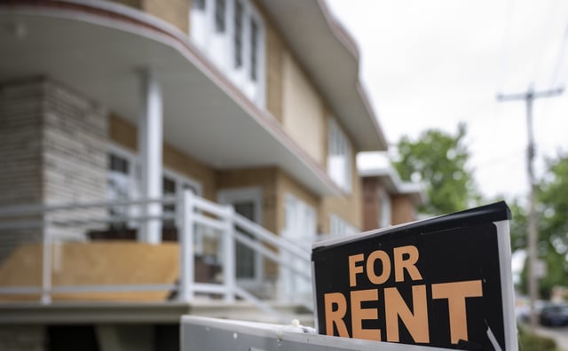 A duplex shows a "For Rent" sign in the Montreal borough of Lasalle on Thursday, June 26, 2025. THE CANADIAN PRESS/Christinne Muschi