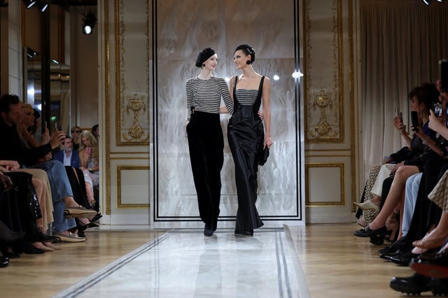 Models present creations by designer Giorgio Armani as part of his Haute Couture Fall/Winter 2025-2026 collection show for fashion house Giorgio Armani Prive, in Paris, France, July 8, 2025. REUTERS/Manon Cruz