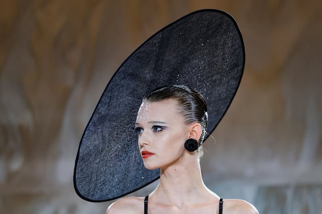 A model presents a creation by designer Giorgio Armani as part of his Haute Couture Fall/Winter 2025-2026 collection show for fashion house Giorgio Armani Prive, in Paris, France, July 8, 2025. REUTERS/Manon Cruz     TPX IMAGES OF THE DAY