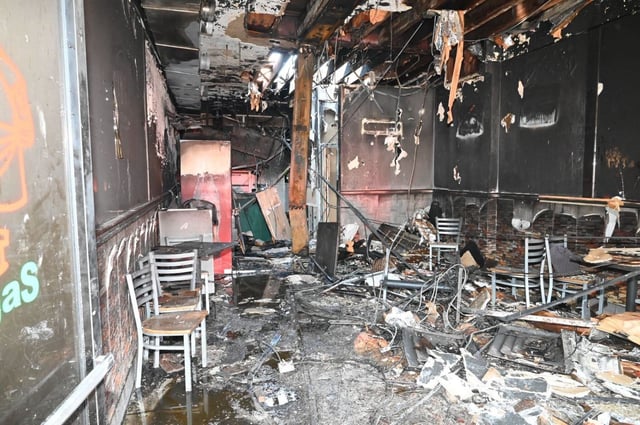 The scene inside a Queen’s pizzeria where an lithium ion battery sparked a fire that claimed the life of a 76-year-old woman. (FDNY)