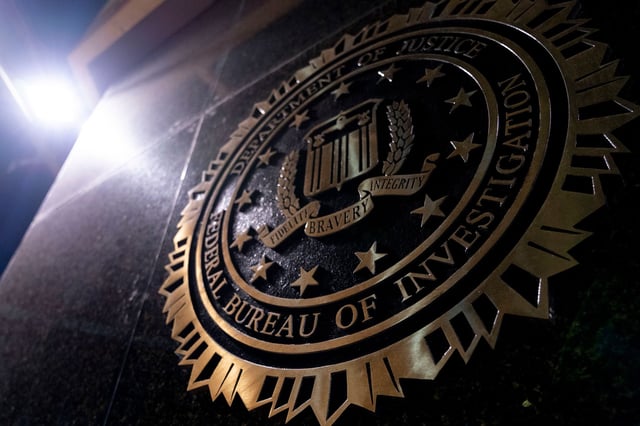 The seal of the Federal Bureau of Investigation (FBI) on the J. Edgar Hoover Federal Bureau of Investigation (FBI) building in Washington, DC, US, on Wednesday, Feb. 5, 2025.
