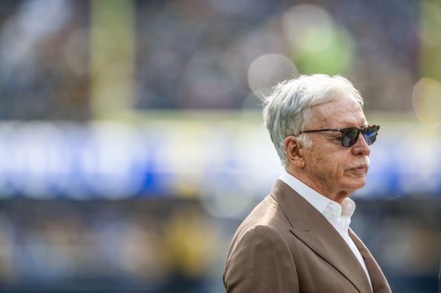 Los Angeles Rams owner Stan Kroenke watches players warm up before a game between the Los Angeles Rams and the Pittsburgh Steelers, on Oct. 22, 2023.