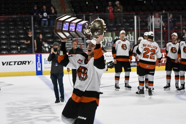 NEWS PHOTO JAMES TUBB Medicine Hat Tigers forward Gavin McKenna lifts the Ed Chynoweth Cup after the Tigers beat the Spokane Chiefs 4-3 on May 16 to capture the franchise's sixth title.