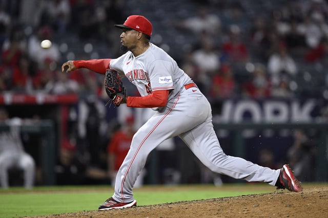 Aug 23, 2023; Anaheim, California, USA; Cincinnati Reds relief pitcher Alexis Diaz (43) throws a pitch against the Los Angeles Angels during the ninth inning at Angel Stadium. Mandatory Credit: Orlando Ramirez-USA TODAY Sports