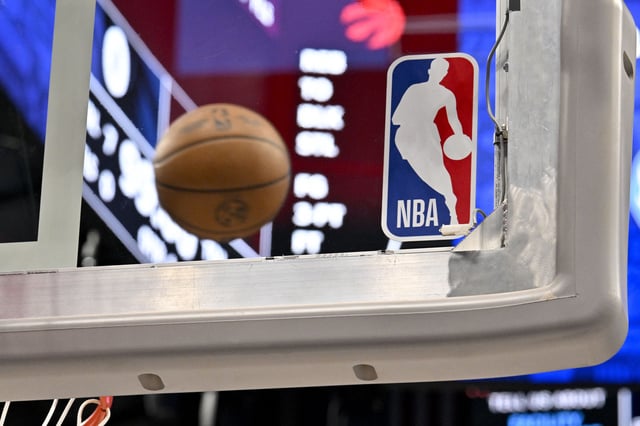 Apr 11, 2025; Dallas, Texas, USA; A view of an NBA basketball and backyard and NBA logo before the game between the Dallas Mavericks and the Toronto Raptors at the American Airlines Center. Mandatory Credit: Jerome Miron-Imagn Images/File Photo