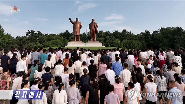 This image of North Koreans mourning state founder Kim Il-sung on the day of his 31st death anniversary on July 8, 2025, is captured from the Korean Central Television. (For Use Only in the Republic of Korea. No Redistribution) (Yonhap)