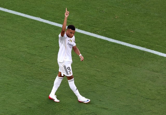 Soccer Football - FIFA Club World Cup - Quarter Final - Real Madrid v Borussia Dortmund - MetLife Stadium, East Rutherford, New Jersey, U.S. - July 5, 2025 Real Madrid's Kylian Mbappe celebrates scoring their third goal REUTERS/Hannah Mckay