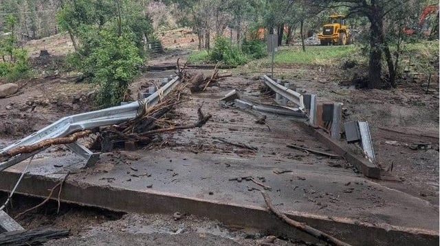 Flooding in Ruidoso, N.M., on Tuesday caused damage to this bridge on State Hwy. 48. Photo courtesy of the New Mexico Department of Transportation