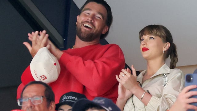 Travis Kelce and Taylor Swift at an NHL game. 
