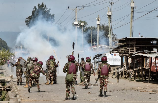 Riot police officers fire tear gas canisters to disperse demonstrators during anti-government protests dubbed "Saba Saba People's March", in the Rift Valley town of Nakuru, Kenya July 7, 2025. REUTERS/Suleiman Mbatiah/File Photo