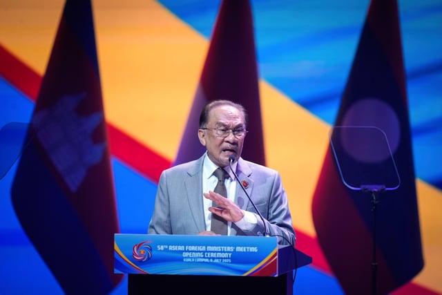 Malaysia's Prime Minister Anwar Ibrahim delivers his keynote address during the opening ceremony of the Association of Southeast Asian Nations (ASEAN) Foreign Ministers' meeting and related meetings at the Convention Centre in Kuala Lumpur, Malaysia, Wednesday, July 9, 2025. (AP Photo/Vincent Thian)