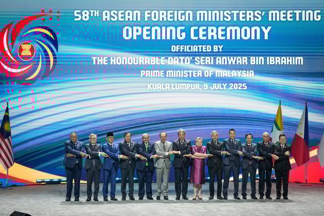 From left to right, East Timor Foreign Minister Bendito dos Santos Freitas, Lao Minister of Affairs Thongsavanh Phomvihane, Indonesia's Foreign Minister Sugiono, Cambodia's Foreign Minister Prak Sokhonn, Brunei's Minister of Foreign Affairs Erywan Yusof, Malaysia's Prime Minister Anwar Ibrahim, Malaysia's Foreign Affairs Minister Mohamad Hasan, Philippine Foreign Secretary Theresa Lazaro, Singapore's Foreign Minister Vivian Balakrishnan, Thailand's Foreign Minister Maris Sangiampongsa, Vietnam's Foreign Minister Bui Thanh Son, Myanmar Ministry of Foreign Affairs representative Kyaw Nyun Oo and ASEAN's Secretary-General Kao Kim Hourn pose for the group photo during the opening ceremony of the Association of Southeast Asian Nations (ASEAN) Foreign Ministers' meeting and related meetings at the Convention Centre in Kuala Lumpur, Malaysia, Wednesday, July 9, 2025. (AP Photo/Vincent Thian)