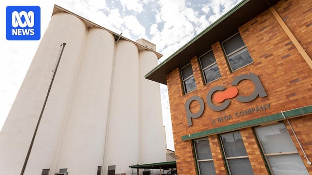 A picture of a PCA sign on an industrial building 