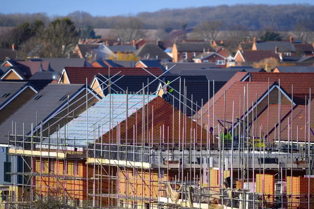 Caption: Housebuilders have agreed to pay £100m towards affordable homes to avoid a regulator&#39;s decision on whether they broke competition law.
(Photo: Joe Giddens/PA)