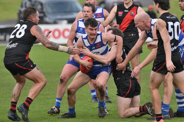 Casterton Sandford's Adam McKinnon finds himself under pressure during Saturday's clash with the Bulldogs. (James Murphy: 489156)
