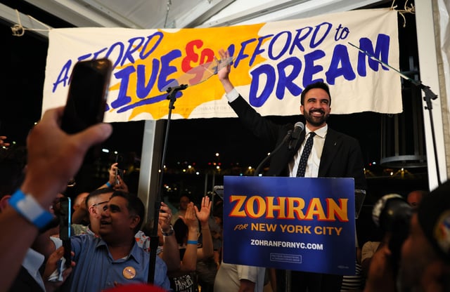 New York mayoral candidate Zohran Mamdani greets supporters during a primary election night gathering on June 24 in Queens.