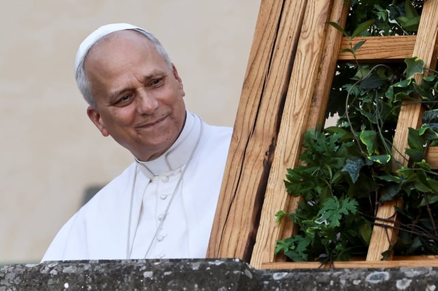 Pope Leo XIV smiles as he arrives at Castel Gandolfo, a hill town on the shores of Lake Albano, where he will be spending two weeks of vacation, in Castel Gandolfo, Italy, July 6, 2025. REUTERS/Vincenzo Livieri/File Photo