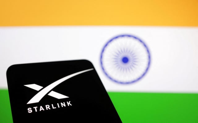 The Starlink logo is seen in front of the Indian flag in this illustration taken, June 21, 2023. REUTERS/Dado Ruvic/Illustration/File Photo
