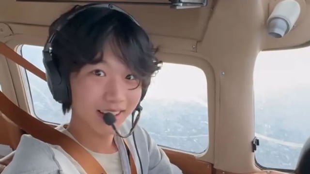 Ethan Guo flying plane and taking selfie