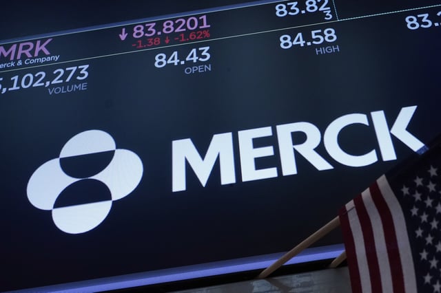 FILE - The logo for Merck appears above a trading post on the floor of the New York Stock Exchange, Thursday, May 1, 2025. (AP Photo/Richard Drew, File)