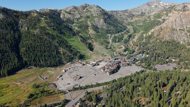 Under a settlement agreement made public July 8, 2025 between Palisades Tahoe, Sierra Watch and the League to Save Lake Tahoe, the ski resort will be permitted to construct 896 new hotel and condominium rooms, commercial space, and a recreation center featuring climbing walls, ziplines, and swimming pools in part of the resort’s main parking lot. (Courtesy of Palisades Tahoe)