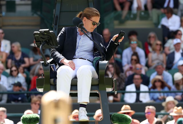 LONDON, ENGLAND - JULY 08: Chair umpire Louise Azemar-Engzell uses the telephone during the Gentleman's Singles Quarter Final match between Taylor Fritz of United States and Karen Khachanov on day nine of The Championships Wimbledon 2025 at All England Lawn Tennis and Croquet Club on July 08, 2025 in London, England. (Photo by Clive Brunskill/Getty Images)