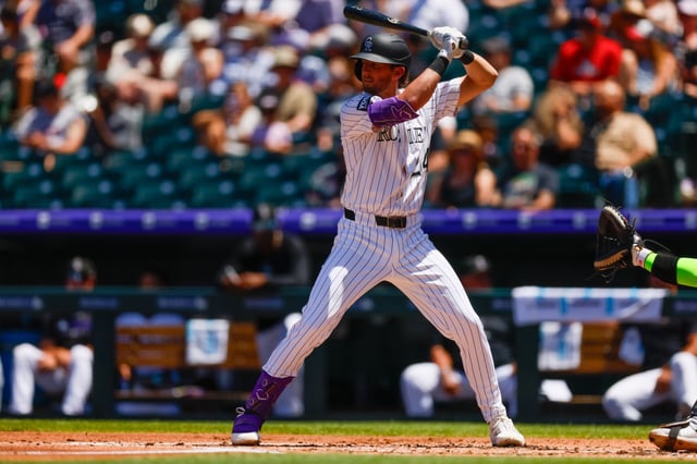 DENVER, CO - JULY 6: Ryan McMahon #24 of the Colorado Rockies bats in the second inning against the Chicago White Sox at Coors Field on July 6, 2025 in Denver, Colorado.