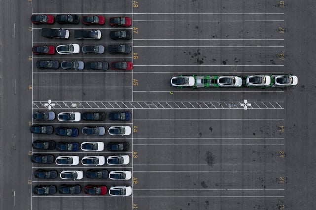 A drone view shows Tesla electric vehicles waiting for shipment outside the Tesla gigafactory in Austin, Texas, U.S., May 2, 2025.   REUTERS/Eli Hartman/File Photo
