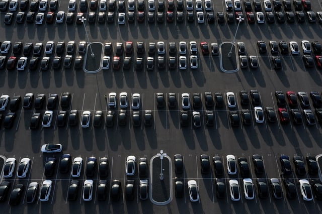 A drone view shows Tesla electric vehicles waiting for shipment outside the Tesla gigafactory in Austin, Texas, U.S., May 2, 2025.   REUTERS/Eli Hartman/File Photo