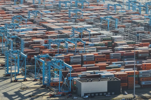 A drone view shows containers stacked at the port of Rotterdam in Rotterdam, Netherlands, July 9, 2025. REUTERS/Bart Biesemans