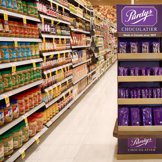 Purdys Chocolatier says the buy Canadian movement has generated so much demand for its products that it decided to sell them outside its own stores for the first time in its 118-year-old history. A Purdys display is seen in a grocery store in this undated handout image. THE CANADIAN PRESS/Handout - Purdys Chocolatier (Mandatory Credit)