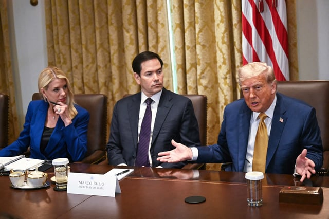 President Donald Trump speaks as Attorney General Pam Bondi (L) and Secretary of State Marco Rubio (C) look on during a cabinet meeting in the Cabinet Room of the White House in Washington, DC, on July 8, 2025.