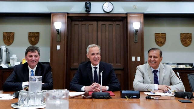 Prime Minister Mark Carney is seen with President of the King’s Privy Council for Canada Dominic LeBlanc and President of the Treasury Board Shafqat Ali. One of Carney's campaign promises was to launch a review of regulatory spending.