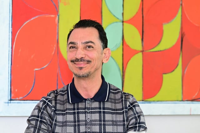 Rami Al Ali poses for a picture in his studio in Dubai on July 1, 2025.