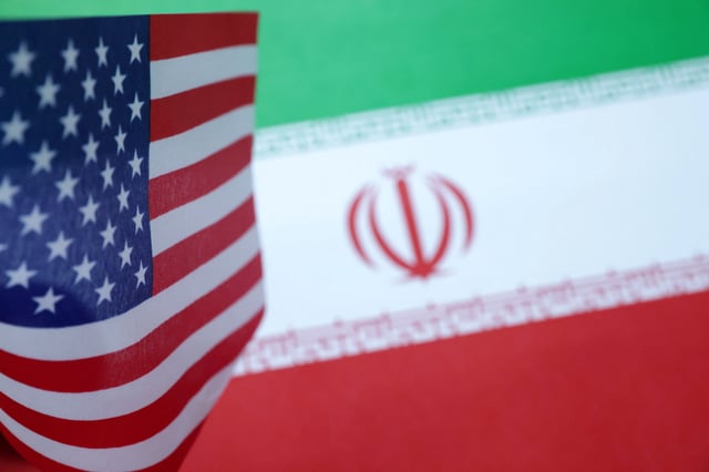 U.S. and Iran flags are seen in this illustration taken June 18, 2025. REUTERS/Dado Ruvic/Illustration