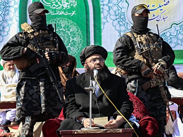 Abdul Kabir (C), Afghanistan's acting Minister of Refugees and Repatriation, speaks during a graduation ceremony of Manba-ul-Jihad, a madrassa or Islamic school, in Khost on January 24, 2025. Afghanistan's Taliban government said on January 24 an arrest warrant sought by the International Criminal Court (ICC) for its leaders was "politically motivated". (Photo by AFP)