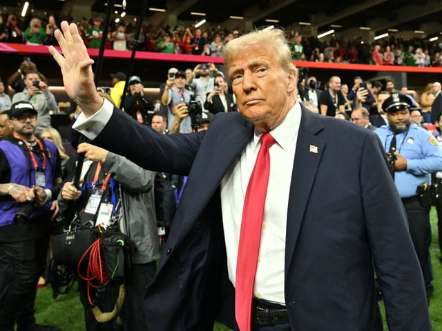US President Donald Trump visits the field before the start of Super Bowl LIX between the Kansas City Chiefs and the Philadelphia Eagles at Caesars Superdome in New Orleans, Louisiana, February 9, 2025. (Photo by ROBERTO SCHMIDT / AFP)