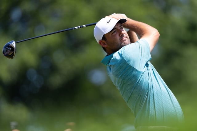 Jun 22, 2025; Cromwell, Connecticut, USA; Scottie Scheffler plays his shot from the first tee during the final round of the Travelers Championship golf tournament. Mandatory Credit: Bill Streicher-Imagn Images/File Photo