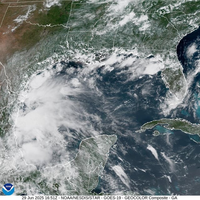 Tropical Storm Barry is shown on satellite off the east coast of Mexico, while scattered clouds are seen off Florida's west coast, where rain could reach into the double digits by the weekend.