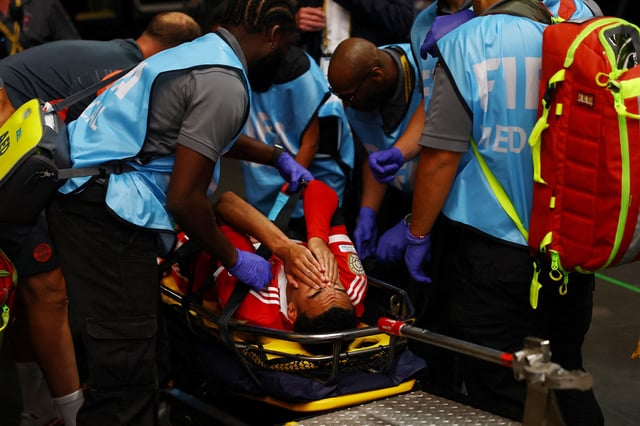 Soccer Football - FIFA Club World Cup - Quarter Final - Paris St Germain v Bayern Munich - Mercedes-Benz Stadium, Atlanta, Georgia, U.S. - July 5, 2025 Bayern Munich's Jamal Musiala is stretchered off after sustaining an injury REUTERS/Kai Pfaffenbach/File Photo
