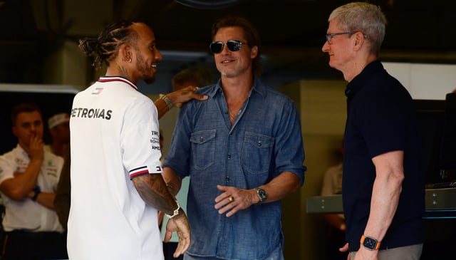 From left to right: Formula 1 star Lewis Hamilton, actor Brad Pitt, and Apple CEO Tim Cook