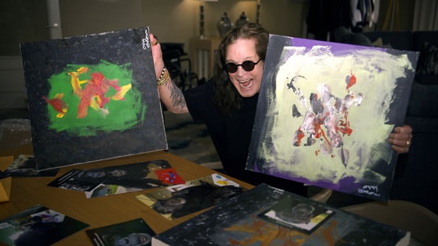 Ozzy Osbourne painted the backgrounds, while the chimps daubed their designs on top