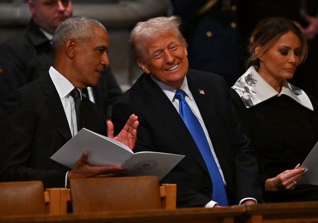 WASHINGTON, DC - JANUARY 9: Former President Barack Obama and President-elect Donald Trump speak together ahead of the state funeral services for former President Jimmy Carter at the National Cathedral on January 9, 2025 in Washington, D.C. President Joe Biden declared today a national day of mourning for Carter, the 39th President of the United States, who died at the age of 100 on December 29, 2024 at his home in Plains, Georgia. (Photo by Ricky Carioti - Pool/Getty Images)