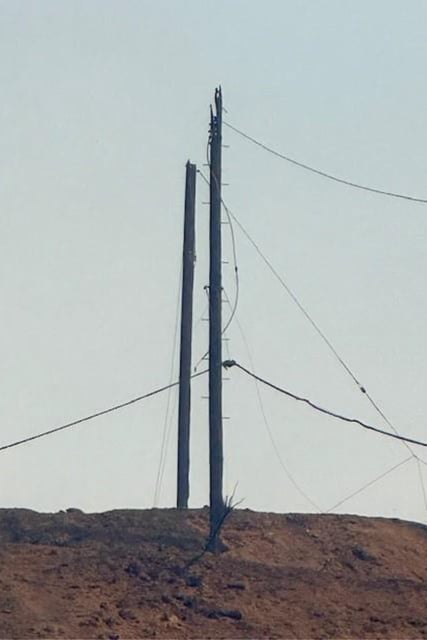 Damaged powerlines pictured Jan. 8, 2025 in the Palisades Fire burn scar, according to images submitted in a lawsuit fire victims filed against the Los Angeles Department of Water and Power.