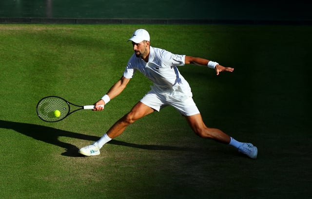 Tennis - Wimbledon - All England Lawn Tennis and Croquet Club, London, Britain - July 9, 2025 Serbia's Novak Djokovic in action during his quarter final match against Italy's Flavio Cobolli REUTERS/Isabel Infantes