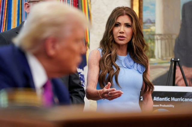 U.S. Homeland Security Secretary Kristi Noem speaks about the Federal Emergency Management Agency next to U.S. President Donald Trump, in the Oval Office at the White House, in Washington, D.C., U.S., June 10, 2025. REUTERS/Nathan Howard/File Photo