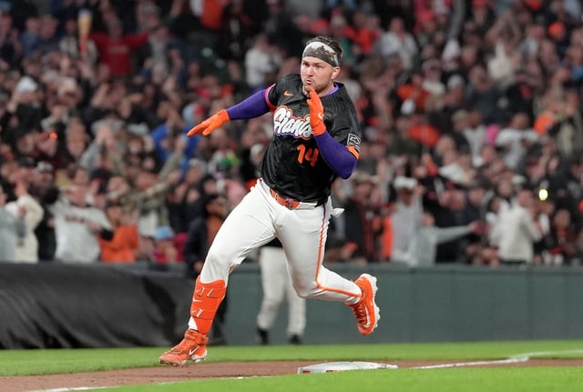 San Francisco Giants catcher Patrick Bailey rounds third base on his way to a three-run, inside-the-park walkoff home run against the Philadelphia Phillies at Oracle Park.