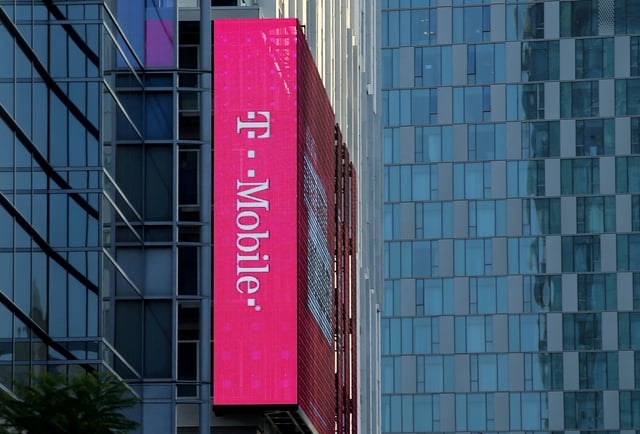 A T-Mobile logo is advertised on a building sign in Los Angeles, California, U.S., May 11, 2017.